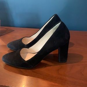 Classic Cole Haan almond toe heels in black suede with a chunky heel.